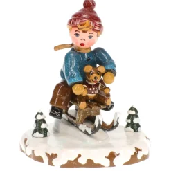 Winterkinder Schlittenfahrer